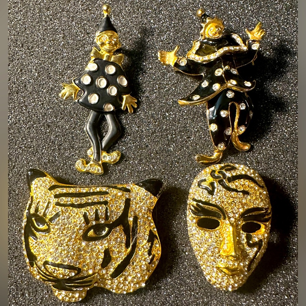 Pin bundle. Gold and black with crystals. One can be worn on a chain.